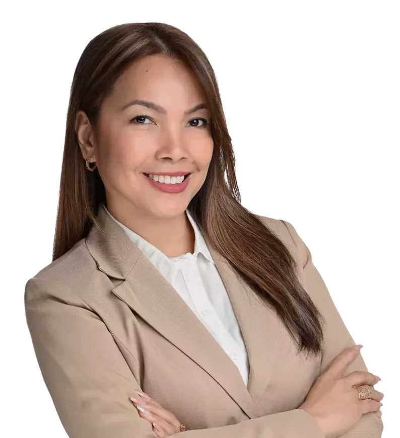 Owner, Maya Castro-Lockhart, smiling at the camera